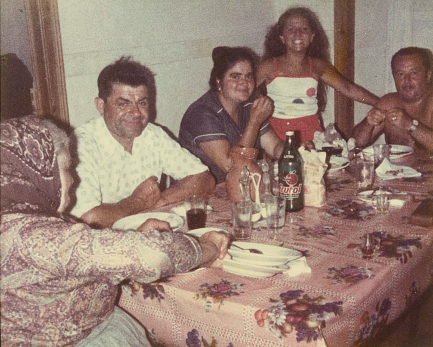 Family gathered around the table for a meal